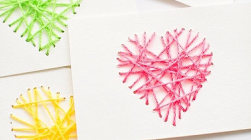 Image of sewn heart on card